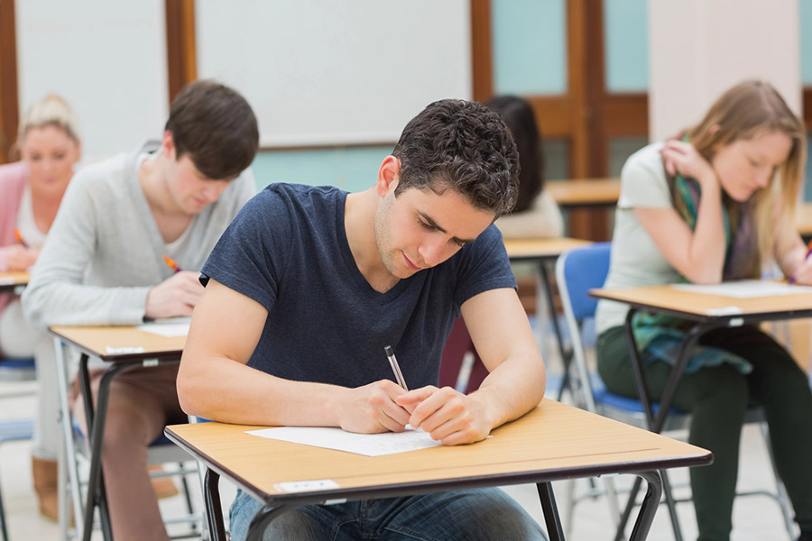 Students taking a test in a classroom in Columbus